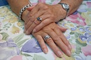 hands with diamond ring