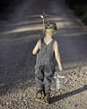 boy bringing fishing  kit